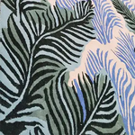 Colorful Botanical Dream Hand Tufted Wool Rug featuring abstract leaf patterns in shades of green and blue, ideal for adding a touch of nature to large living room spaces. This beautiful area rug measures 8x10, perfect for those seeking large area rugs made from high-quality wool.