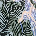 Colorful Botanical Dream Hand Tufted Wool Rug featuring abstract leaf patterns in shades of green and blue, ideal for adding a touch of nature to large living room spaces. This beautiful area rug measures 8x10, perfect for those seeking large area rugs made from high-quality wool.