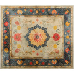 This elegant Botanical Grace Wool Hand Knotted Area Rug showcases a stunning vintage Persian design. Rich floral motifs in vibrant reds, blues, and yellows adorn the rug, making it perfect for adding a touch of classic charm to large living rooms. Ideal as an 8x10 living room rug, this piece combines timeless beauty with modern sophistication.