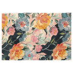A vibrant Botanical Symphony Hand Tufted Wool Area Rug featuring an array of colorful floral patterns in shades of orange, pink, and blue on a soft, neutral background. The intricate design creates an inviting and cozy atmosphere, perfect for enhancing any living space.