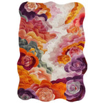 Vibrant Bouquet Nouveau Hand Tufted Area Rug featuring an abstract floral design with rich colors like purple, orange, and pink, creating a warm and inviting atmosphere.