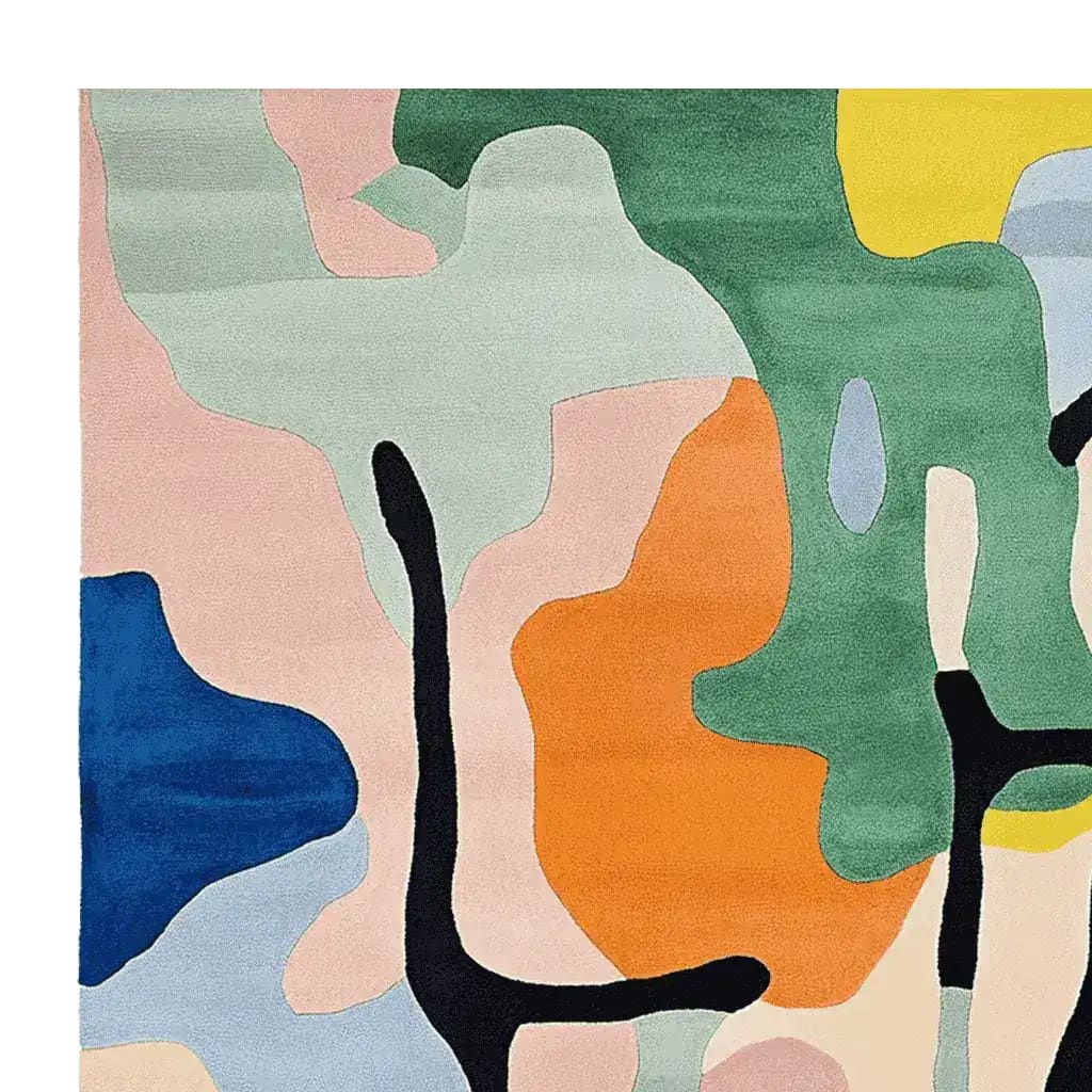 A vibrant Branching Color Field Hand Tufted Rug, showcasing an abstract design with bold, colorful shapes in green, orange, blue, and pink hues. Perfect for adding a touch of contemporary elegance to living room spaces, this wool area rug blends seamlessly with modern decor.