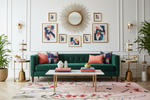 Living room with a green sofa, colorful floral hand made wool rug, and decorative wall art.