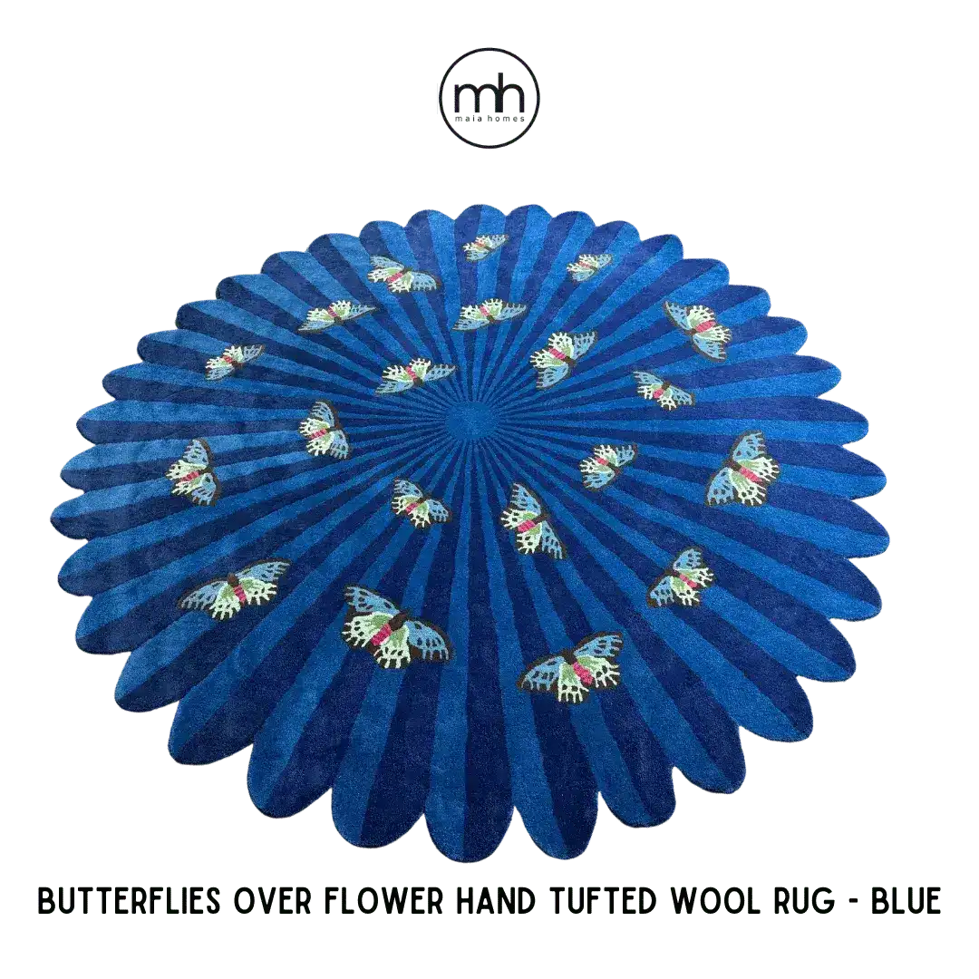 A vibrant round wool rug featuring a deep blue background with butterflies elegantly scattered over a flower-like design, perfect for enhancing the aesthetic of a bedroom or living room. Ideal as a centerpiece in living room area rugs, especially in the 8x10 size category.