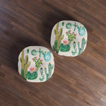 Vintage inspired round throw pillow featuring a colorful cactus design, perfect for adding a touch of nature to your home decor.