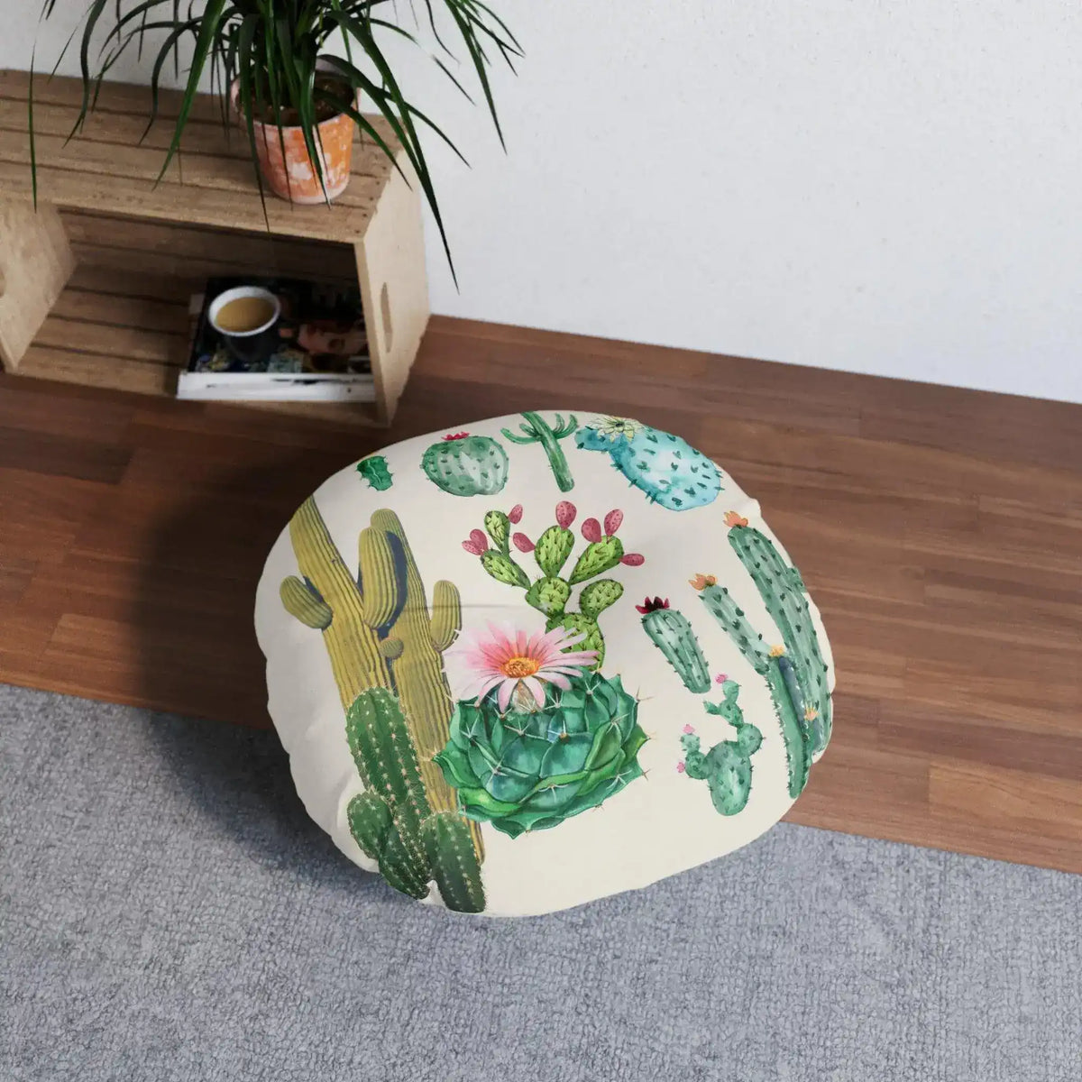 Vintage inspired tufted round floor pillow featuring a colorful cactus design, perfect for adding a touch of nature to your home decor.