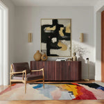 calming colors hand knotted wool rug with pastel pink blue yellow red abstract splashes in elegant sitting room