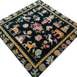 This Cambodian Heritage Wool Hand Knotted Area Rug showcases intricate traditional patterns featuring vibrant animal and floral motifs in rich colors, perfect for enhancing your living room or bedroom. This square wool rug is a stunning addition to any interior, bringing a touch of elegance and cultural heritage to your space.