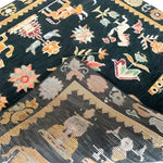 Experience the intricate beauty of the Cambodian Heritage Wool Hand Knotted Area Rug, perfect for adding a touch of elegance to your living room or bedroom. This exquisite square area rug features vibrant floral and traditional motifs, highlighting its craftsmanship. Ideal as a wool rug for any bedroom area, the rich colors and detailed design make it a standout piece among bedroom rugs.