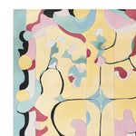 Vibrant Candy Orchard hand-tufted area rug featuring an abstract design with bold colors including yellow, pink, blue, and black. Perfect for adding a contemporary touch to living room area rugs. This wool rug showcases a unique pattern that stands out in rugs for living room settings.