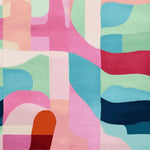 Vibrant Candy Wave Mirage hand-tufted wool area rug featuring an abstract design with bold pink, blue, and green shapes. Perfect for adding a contemporary touch to living room area rugs, this rug blends seamlessly into modern decor while offering comfort and style.