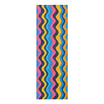 Carnival Currents yoga mat with wavy vertical stripes in pink, yellow, blue and navy with speckles