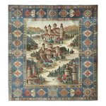 This Castle Country Wool Hand Knotted Area Rug features a picturesque medieval castle scene with lush greenery and vibrant colors. The intricate design showcases detailed architecture set against a scenic landscape, surrounded by a decorative blue and red border. Perfect for adding a touch of elegance and history to any room.