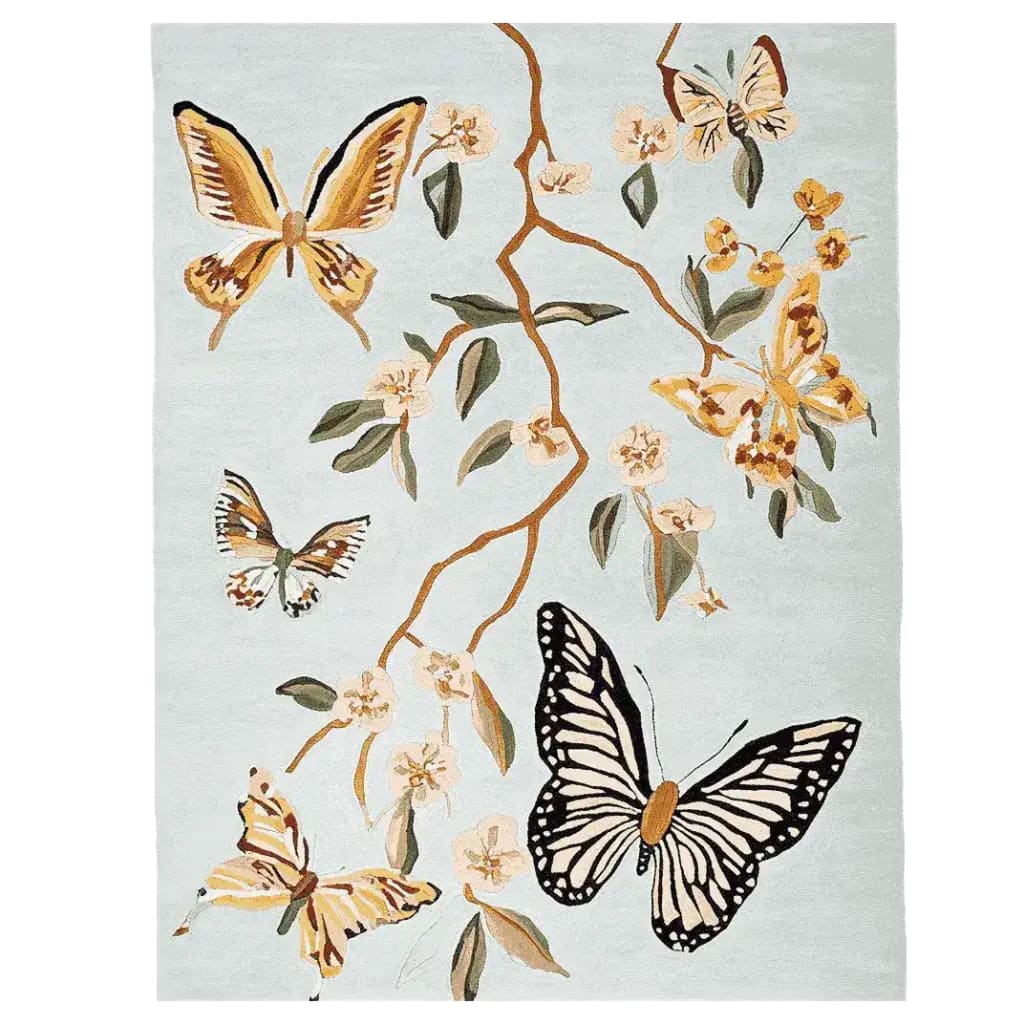 Catch the Flutter Hand Tufted Area Rug featuring an elegant design with butterflies and floral patterns. This wool rug is perfect for adding a touch of nature-inspired beauty to your living room. Ideal for those seeking stylish living room area rugs.
