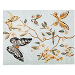 A beautifully hand-tufted area rug featuring a vibrant design of butterflies and floral motifs. This wool rug is perfect for adding a touch of elegance to any living room, making it a stunning choice among living room area rugs.