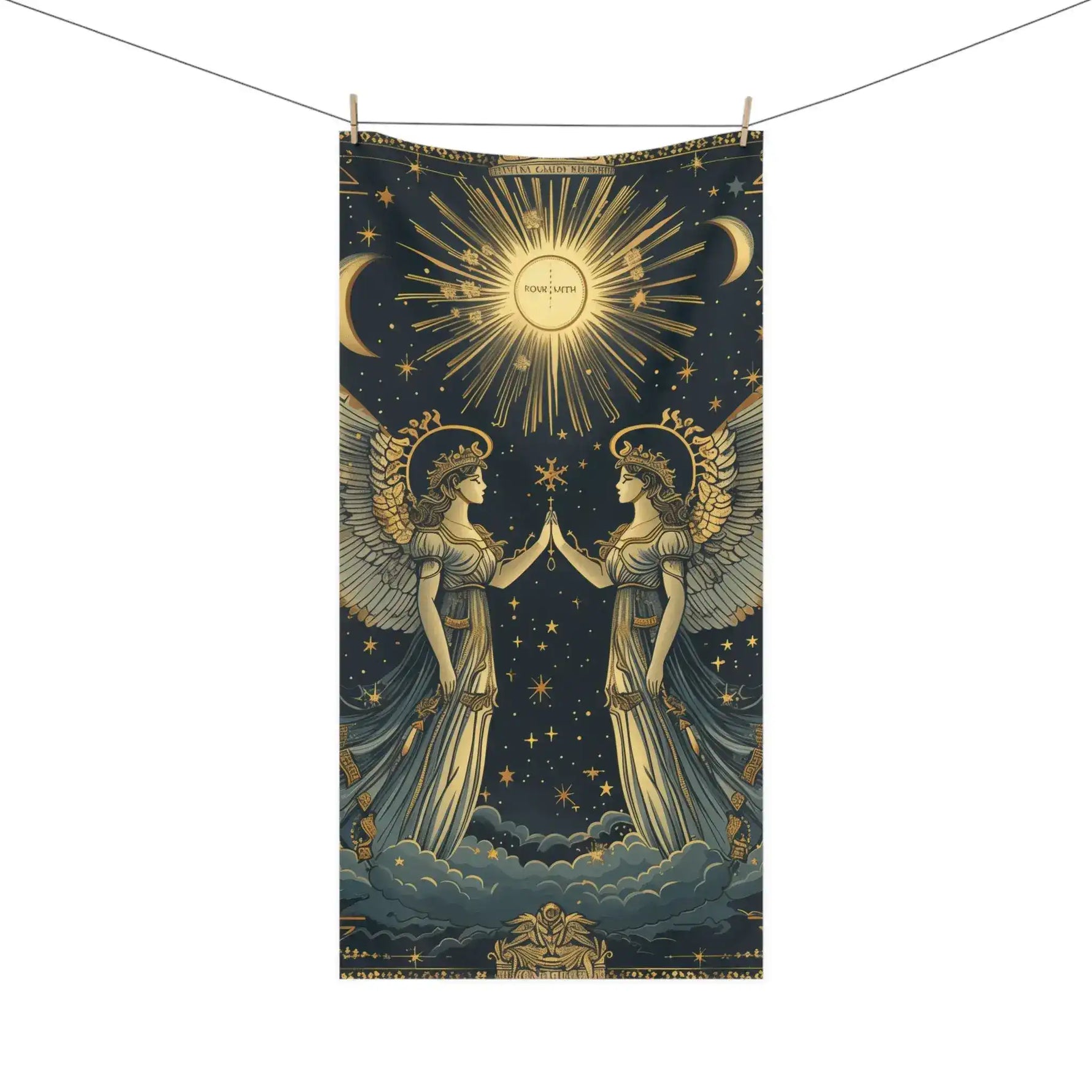 Celestial angels vintage zodiac bath towel hanging on clothesline with clothespins against white background