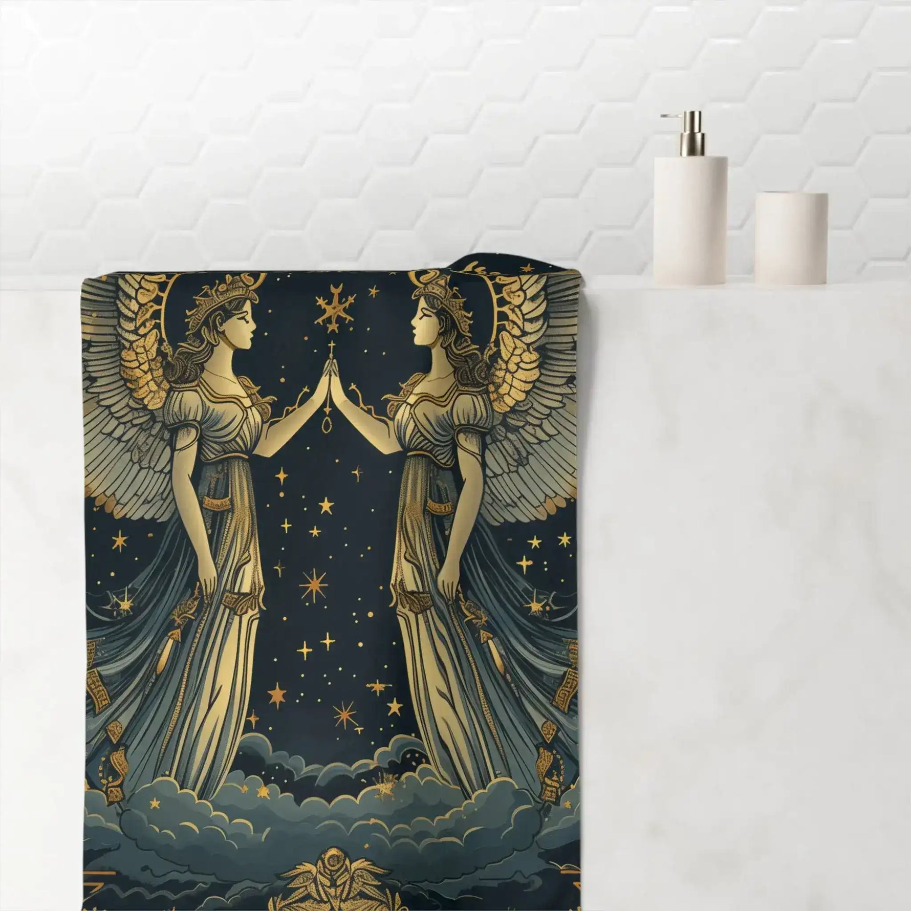Celestial angels vintage zodiac bath towel draped on marble bathroom surface with soap dispenser and candle