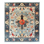 Elegant Celestial Blooms Hand Tufted Area Rug featuring a vibrant floral pattern, ideal for enhancing office spaces or adding warmth to living rooms. This wool rug, with its intricate design and rich colors, serves as a stunning centerpiece for any setting, perfect for those seeking quality rugs for office or living room area rugs.