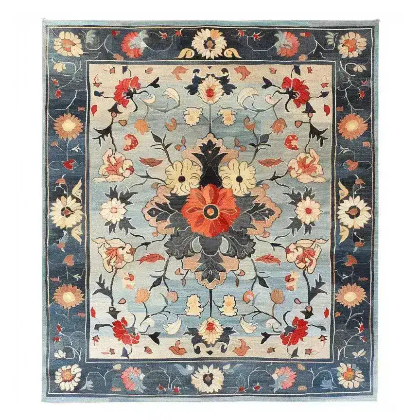 Elegant Celestial Blooms Hand Tufted Area Rug featuring a vibrant floral pattern, ideal for enhancing office spaces or adding warmth to living rooms. This wool rug, with its intricate design and rich colors, serves as a stunning centerpiece for any setting, perfect for those seeking quality rugs for office or living room area rugs.