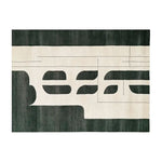 Top view of the Celestial Cosmos Song Knotted Wool Area Rug featuring a modern abstract design with bold black and white patterns, perfect for adding a contemporary touch to any space.