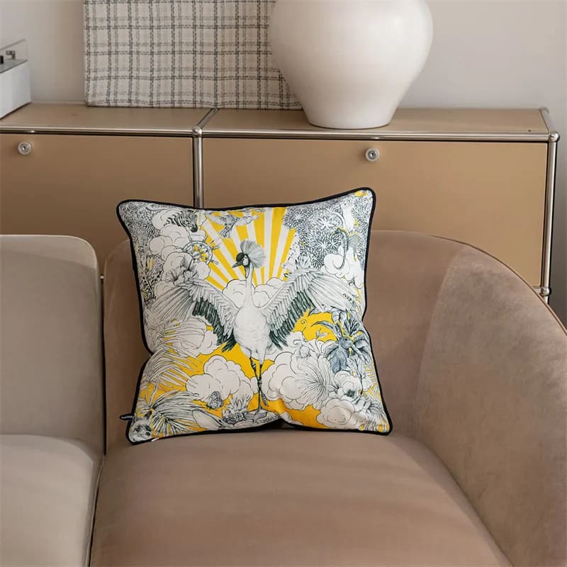 Celestial crane throw pillow cover featuring intricate floral designs and a vibrant yellow background, perfect for adding a touch of elegance to any living space.