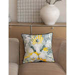 Celestial crane throw pillow with vibrant yellow and blue design, featuring floral elements and a serene backdrop, perfect for home decor.