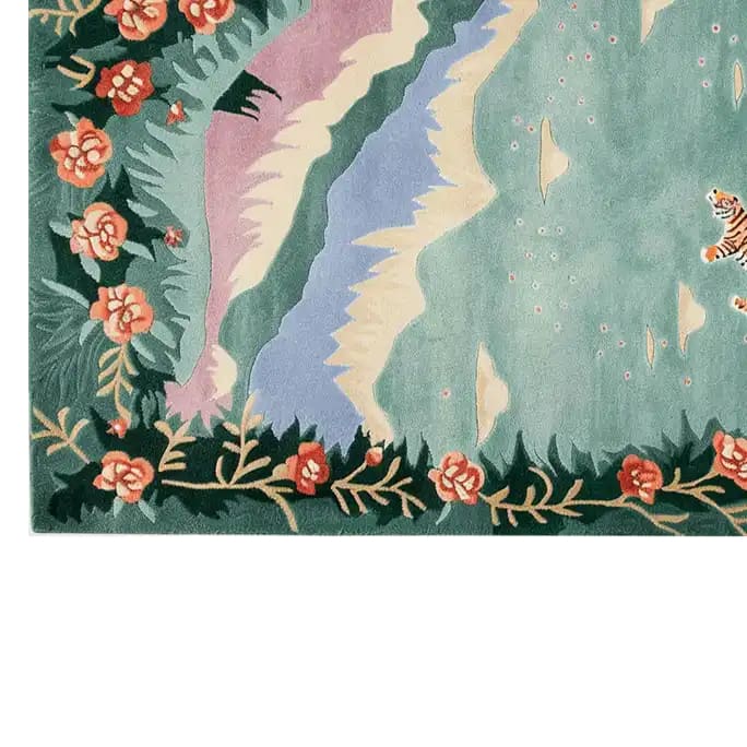 A stunning hand-tufted wool area rug showcasing a celestial drift design with vibrant floral patterns and a playful tiger motif on a soft, multicolored background. Perfect for adding a touch of elegance and whimsy to any room.