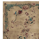 A beautifully detailed area rug featuring a celestial floral design, hand-knotted with intricate patterns in rich tones of teal and burgundy on a soft beige background. This wool rug is perfect for adding elegance to your living room.