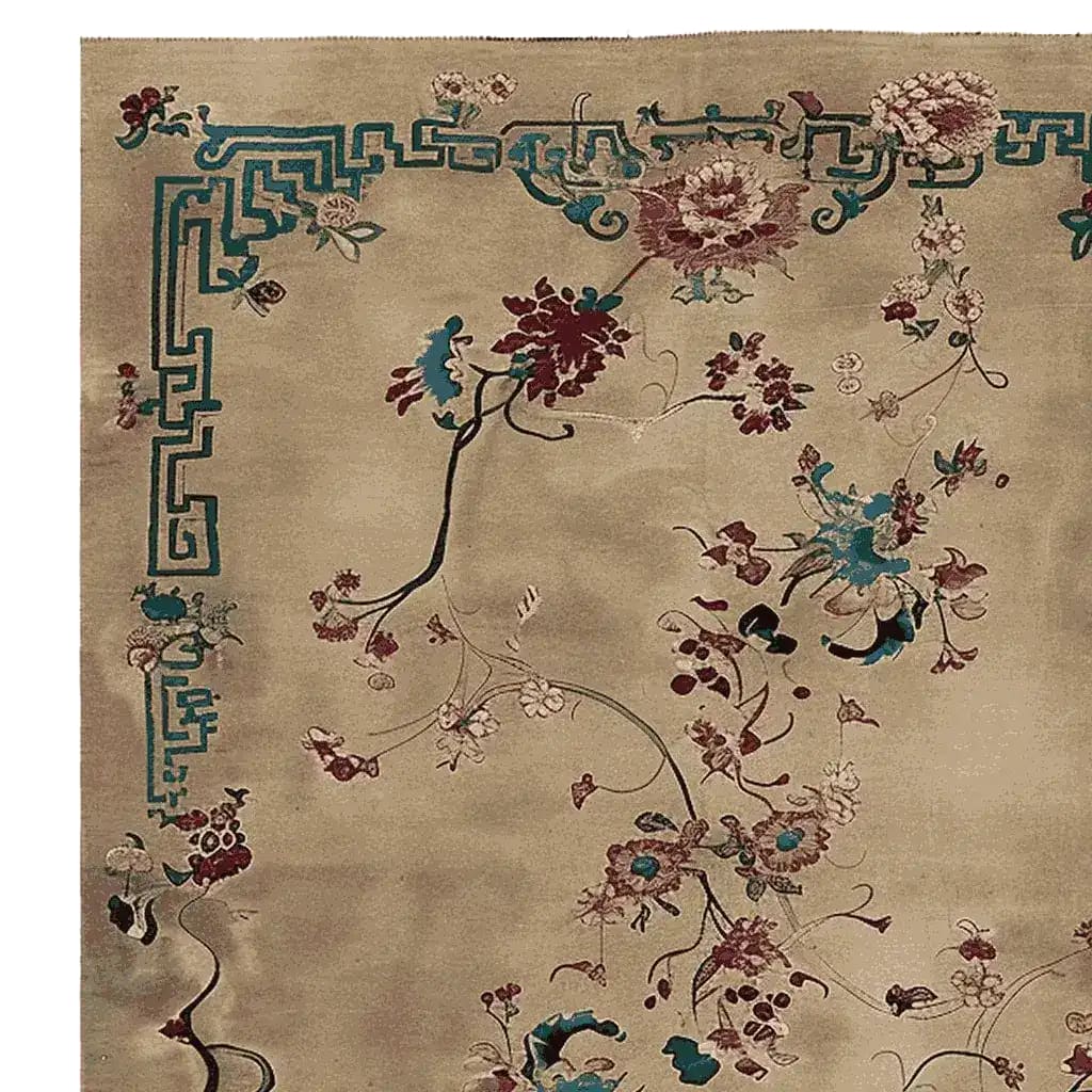 A beautifully detailed area rug featuring a celestial floral design, hand-knotted with intricate patterns in rich tones of teal and burgundy on a soft beige background. This wool rug is perfect for adding elegance to your living room.