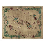 A beautifully crafted area rug featuring a celestial floral design, hand knotted in rich wool. This elegant floral rug, perfect for enhancing living room decor, showcases intricate patterns with a harmonious blend of colors on a neutral background.