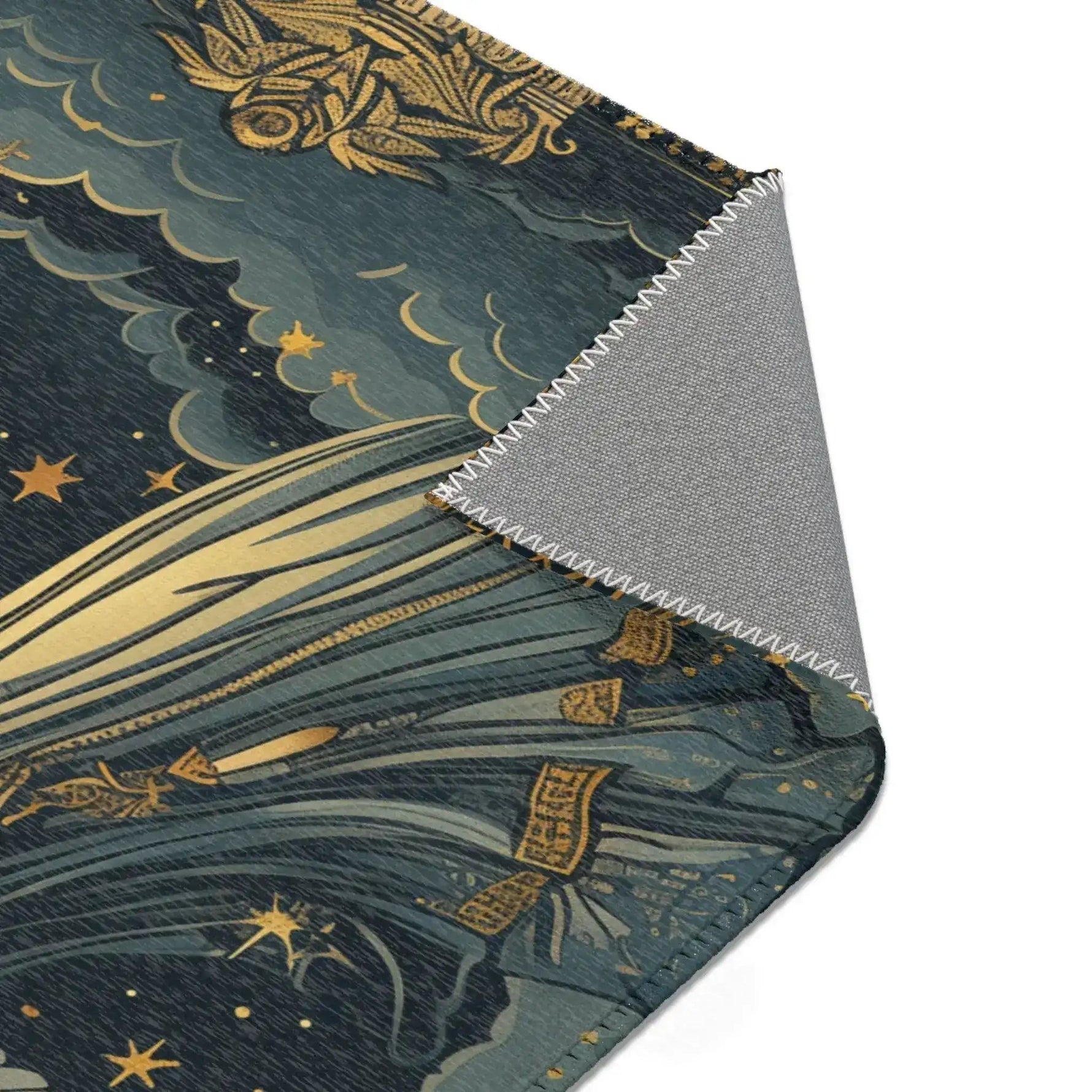 Celestial Gemini Zodiac-Inspired Rug folded corner with gold celestial motifs on navy and grey anti-slip backing visible