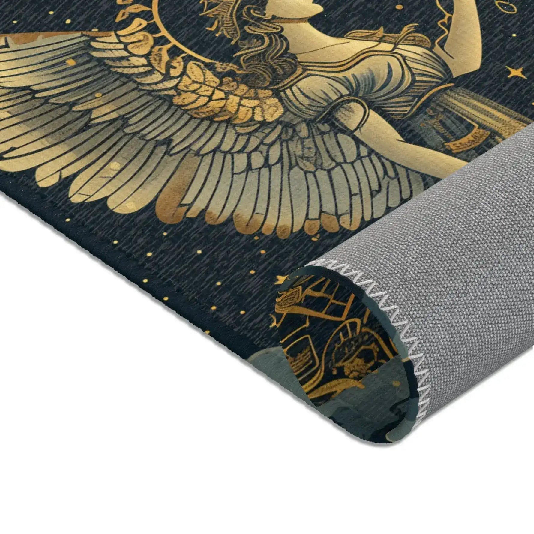 Celestial Gemini Zodiac-Inspired Rug rolled edge showing gold-winged figure detail and grey non-slip backing