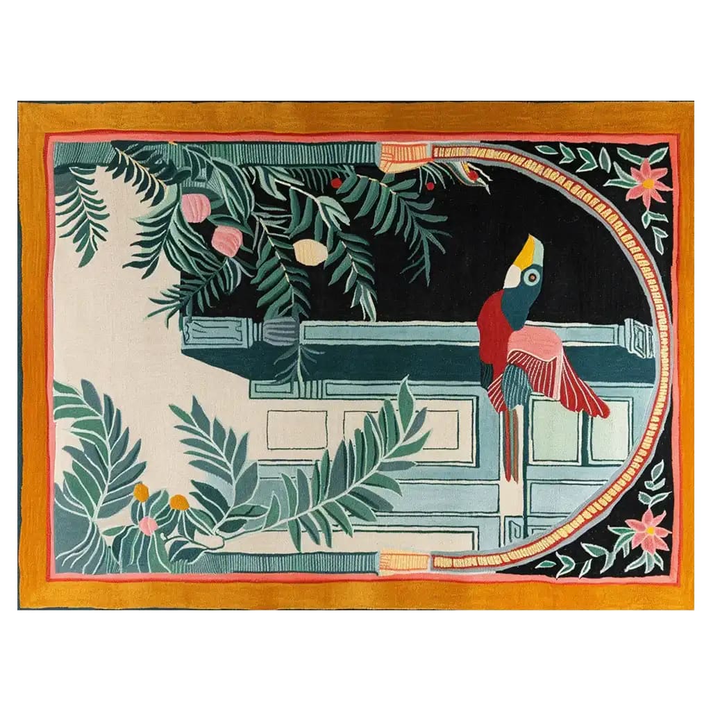 Vibrant hand-tufted wool area rug featuring an abstract design with a colorful phoenix perched amidst lush green foliage and floral elements, bordered by a warm golden hue.