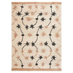 Top view of the Celestial Rhapsody Knotted Wool Rug featuring a cream background with an abstract star pattern in black and beige tones, ideal for adding a touch of elegance to any space.