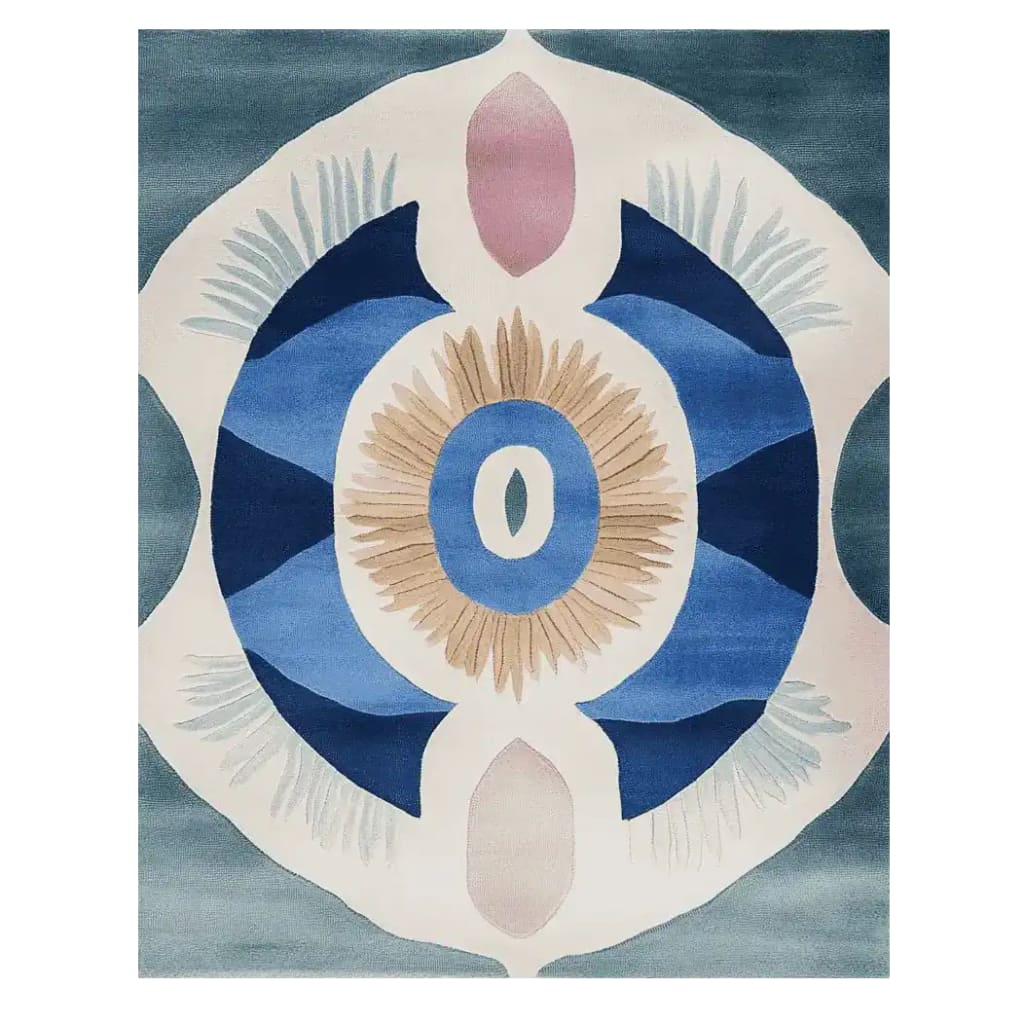 The Celestial Spiral Hand Tufted Rug features a striking abstract design with bold blue hues and a central circular motif, perfect as an area rug for contemporary living rooms. This wool rug, measuring 8x10, adds a modern touch to any space.