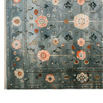 A beautifully detailed area rug featuring an intricate floral design, perfect for enhancing any living room. The Celestial Tranquility Knotted Wool Rug showcases vibrant patterns in a blend of warm and cool tones, making it an ideal choice for large living room rugs.