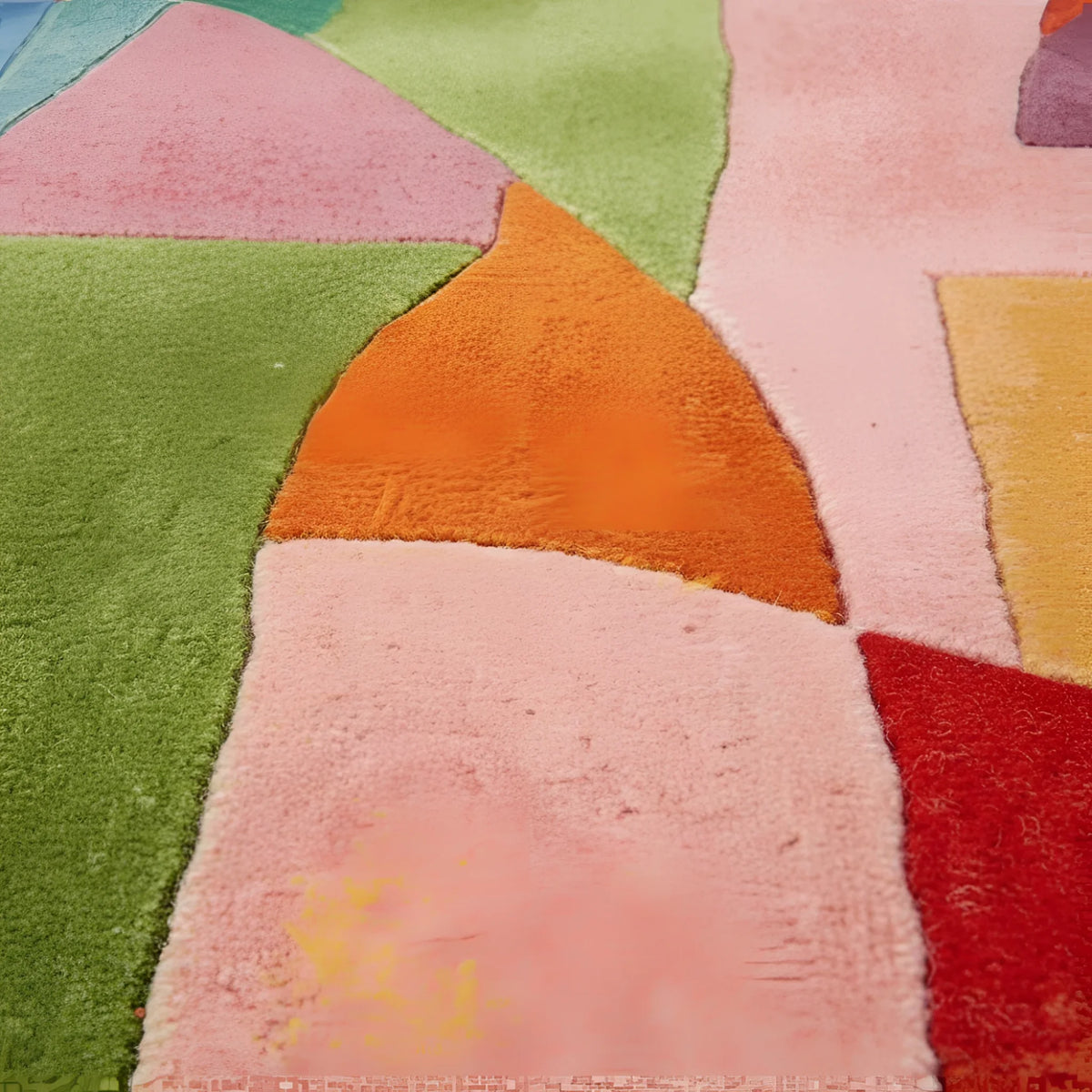 Close-up of a colorful patchwork rug with geometric patterns.