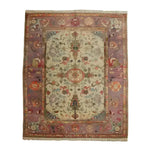 Charming Blooms Hand Knotted Area Rug featuring an intricate floral pattern with a blend of earthy tones and detailed borders, showcasing the craftsmanship of traditional rug making.