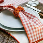 Checkered Charm Placemats close-up showing black and white check pattern and scalloped border