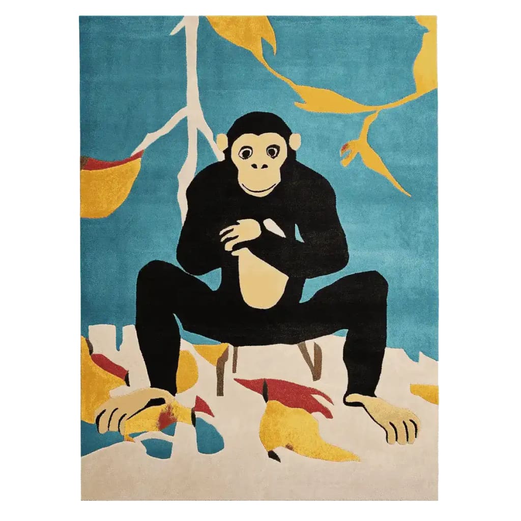 Colorful area rug featuring a playful chimpanzee sitting with vibrant yellow and red abstract leaves against a blue background. This wool rug adds a contemporary touch to large living room spaces.
