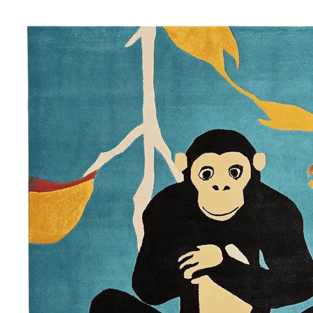 Cheeky Chimp Chill Hand Tufted Area Rug featuring a playful monkey design on a vibrant blue background. This contemporary wool rug is perfect for adding a touch of whimsy to large living room spaces.