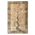Cherry Blossom Elegance Knotted Wool Area Rug featuring an intricate design with delicate cherry blossom branches and a subtle border, showcasing a blend of soft beige and pink tones.