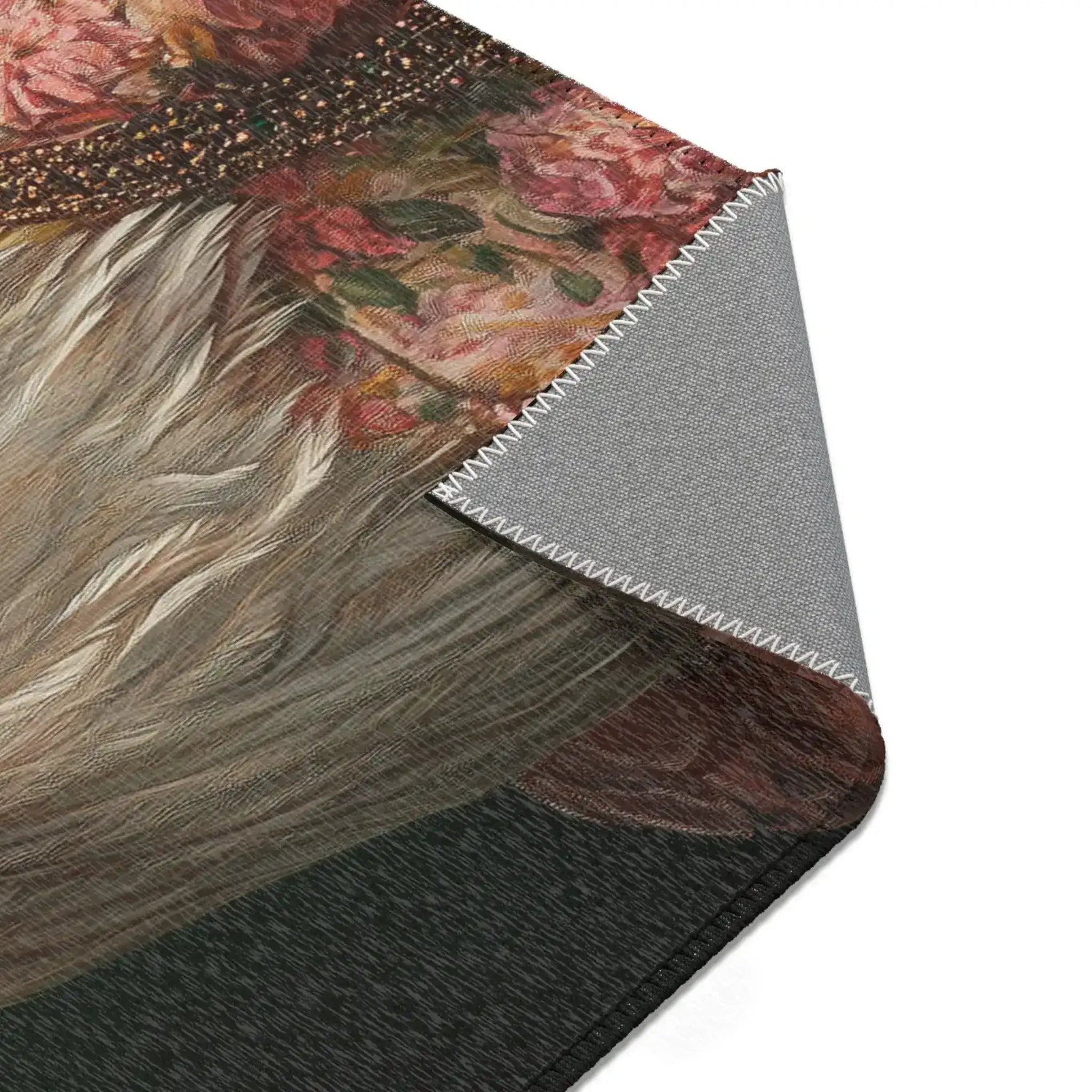 Woven rug hung on clothesline showing two fighting tigers in gold surrounded by pink roses on blue-grey ground, Chic Renaissance Chicken Accent Rug