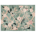 This beautiful area rug features a Chinoiserie Bird Ballet design with intricate birds and floral patterns set against a soft green background. Perfect for large living room rugs, this hand-tufted wool rug brings elegance and charm to any living room area.