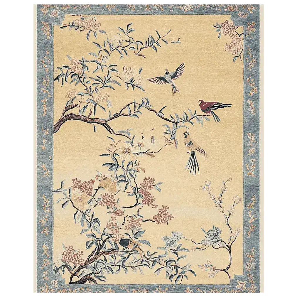 The Chinoiserie Dreamscape Hand Tufted Rug is an exquisite area rug featuring a serene garden scene with birds and floral branches, set against a soft background. Ideal for adding a touch of elegance to large living rooms, this high-quality wool rug blends traditional art with modern design.