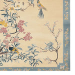 A stunning Chinoiserie Dreamscape Hand Tufted Area Rug, perfect for enhancing a living room with its intricate bird and floral design. This large wool rug features vibrant colors and a detailed border, making it an ideal choice for those seeking elegant area rugs for living rooms.