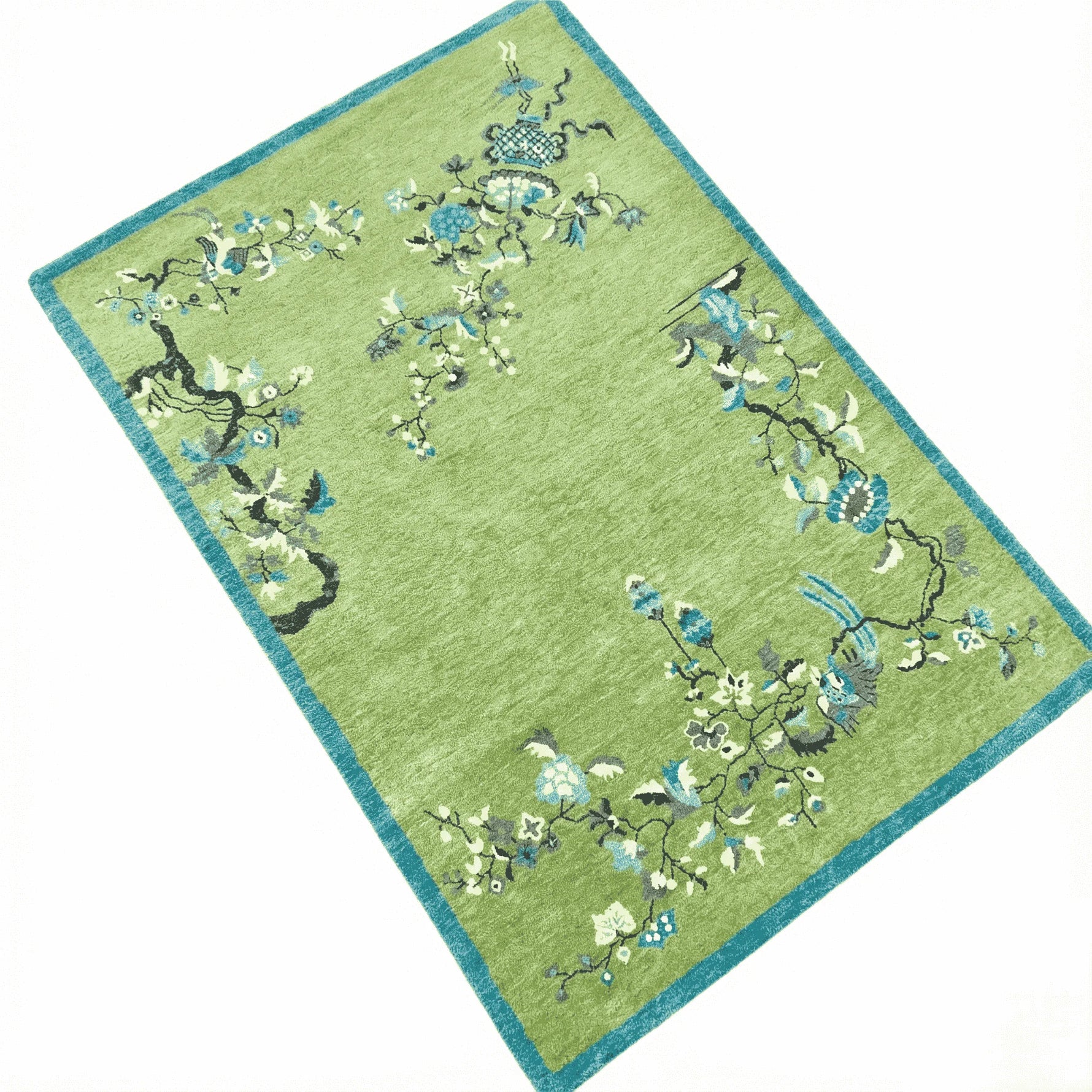 Decorative rug with floral patterns on a green background