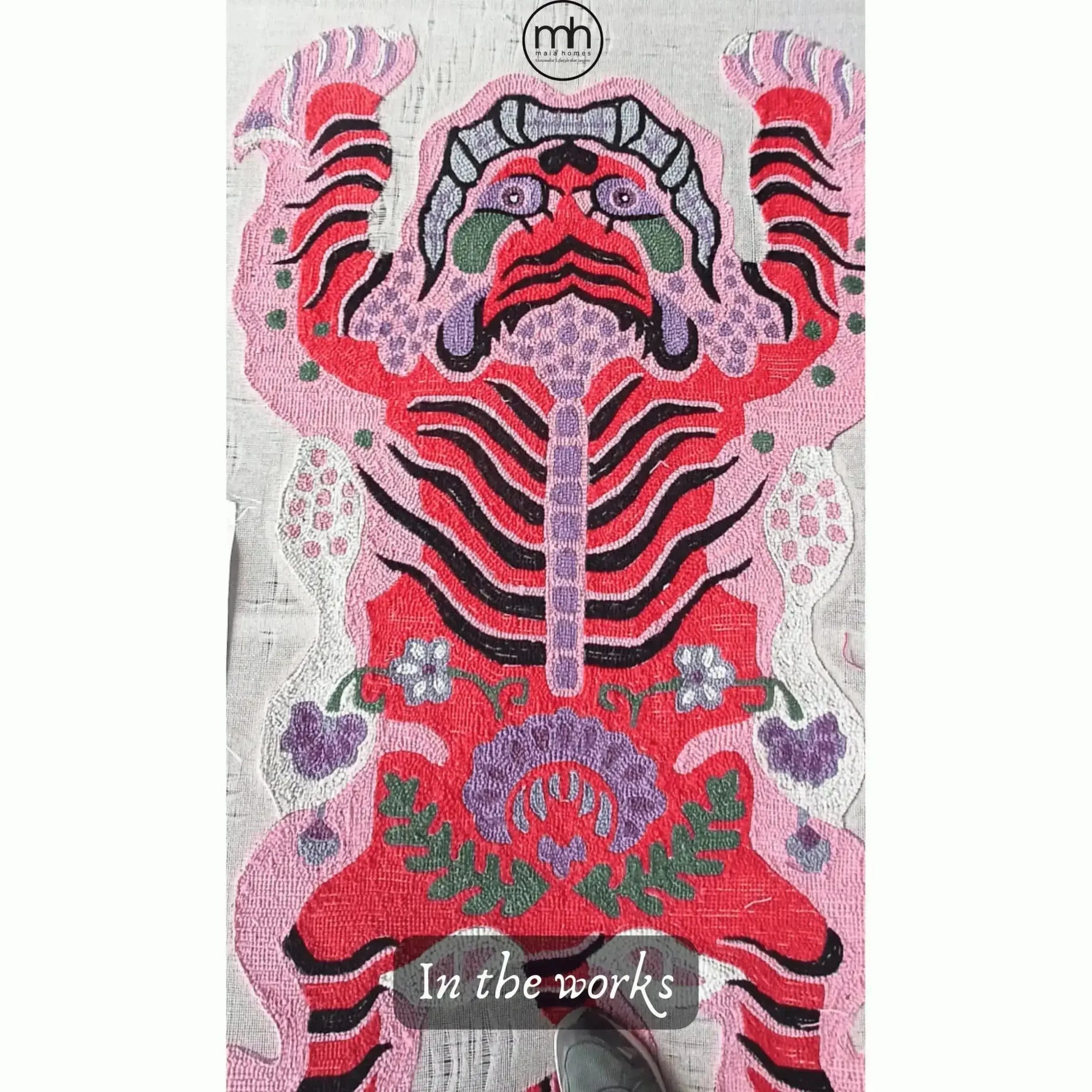 This vibrant Chinoiserie Pink Tibetan Tiger Tufted Wool Rug is an eye-catching addition to any living room. Featuring an abstract tiger motif in bold pink, red, and purple hues, this area rug is perfect for those seeking large living room rugs that make a statement. The intricate wool design adds texture and depth, making it an ideal wool rug for stylish interiors.