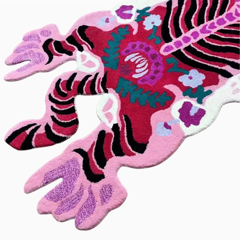 A vibrant Chinoiserie Pink Tibetan Tiger tufted wool area rug, showcasing an abstract tiger design with bold pink, red, and black patterns. Perfect for adding a touch of art to large living room spaces, this wool rug combines style and comfort.