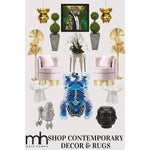 A vibrant Chinoiserie Tibetan Tiger Hand Tufted Wool Rug in blue, featured among contemporary decor items like plush pink chairs and stylish gold accents. Perfect for adding a bold touch to your office or dining room, this area rug combines luxury and artistic flair.